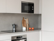Cocina cashmere lineal abierta al salón