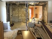 Reforma integral amb tocs en verd, taronja i tons clars